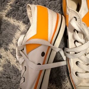 Orange and white pony sneakers